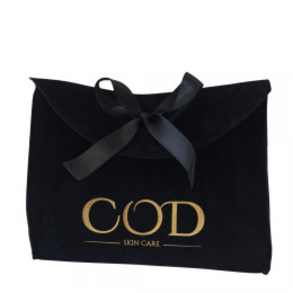 Trousse en velours et noeud en satin